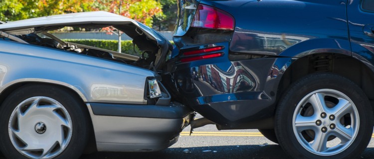 Car accident illustrating how commercial auto symbols on a Business Auto Coverage Form determine coverage.